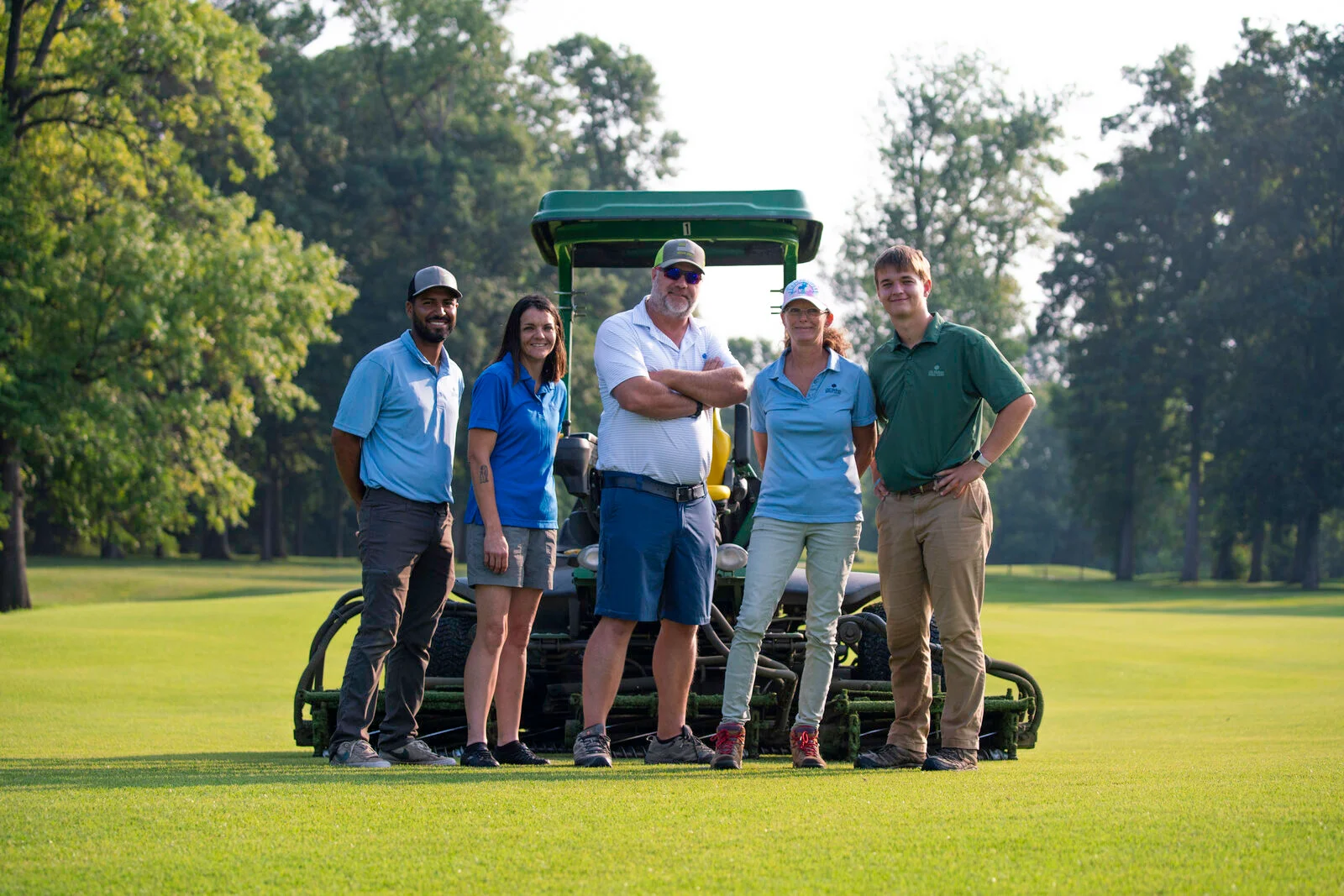 A foursome at Old Hickory, posing at the trophy